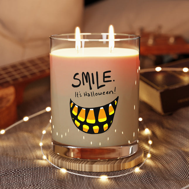 Smile candle jar with kraft lid beside it — funny candy corn Halloween candle gift