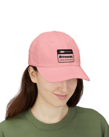 Model wearing pink Brrooom dad cap with Brrooom patch — quirky Halloween costume hat