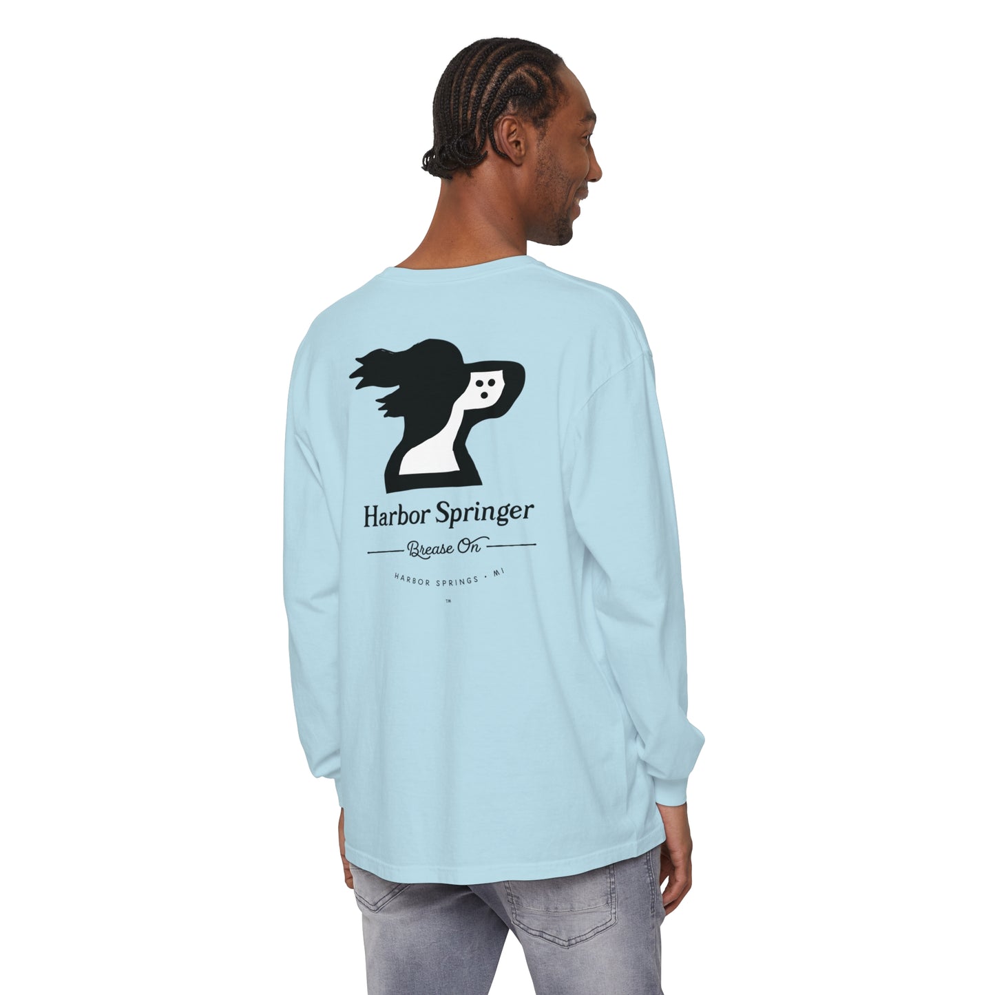 Man wearing light blue color long sleeve t-shirt by the Harbor Springer brand with a springer spaniel dog logo and Brease On tagline on the back.