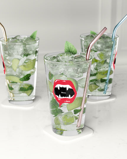 Clear Burp Fangs pint glass, angled view — quirky Halloween barware gift