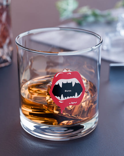 Clear Burp Fangs 10oz rocks glass, angle view — quirky Halloween whiskey glass