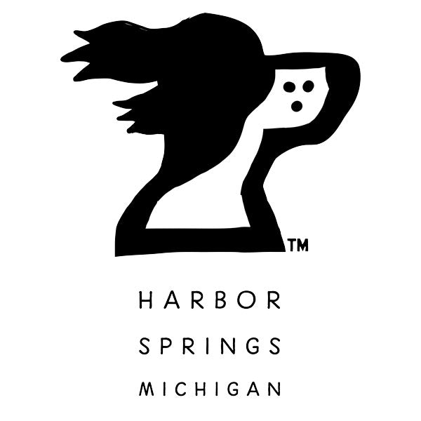 Clothing design featuring a springer spaniel dog logo and Harbor Springs Michigan text by the Harbor Springer brand.