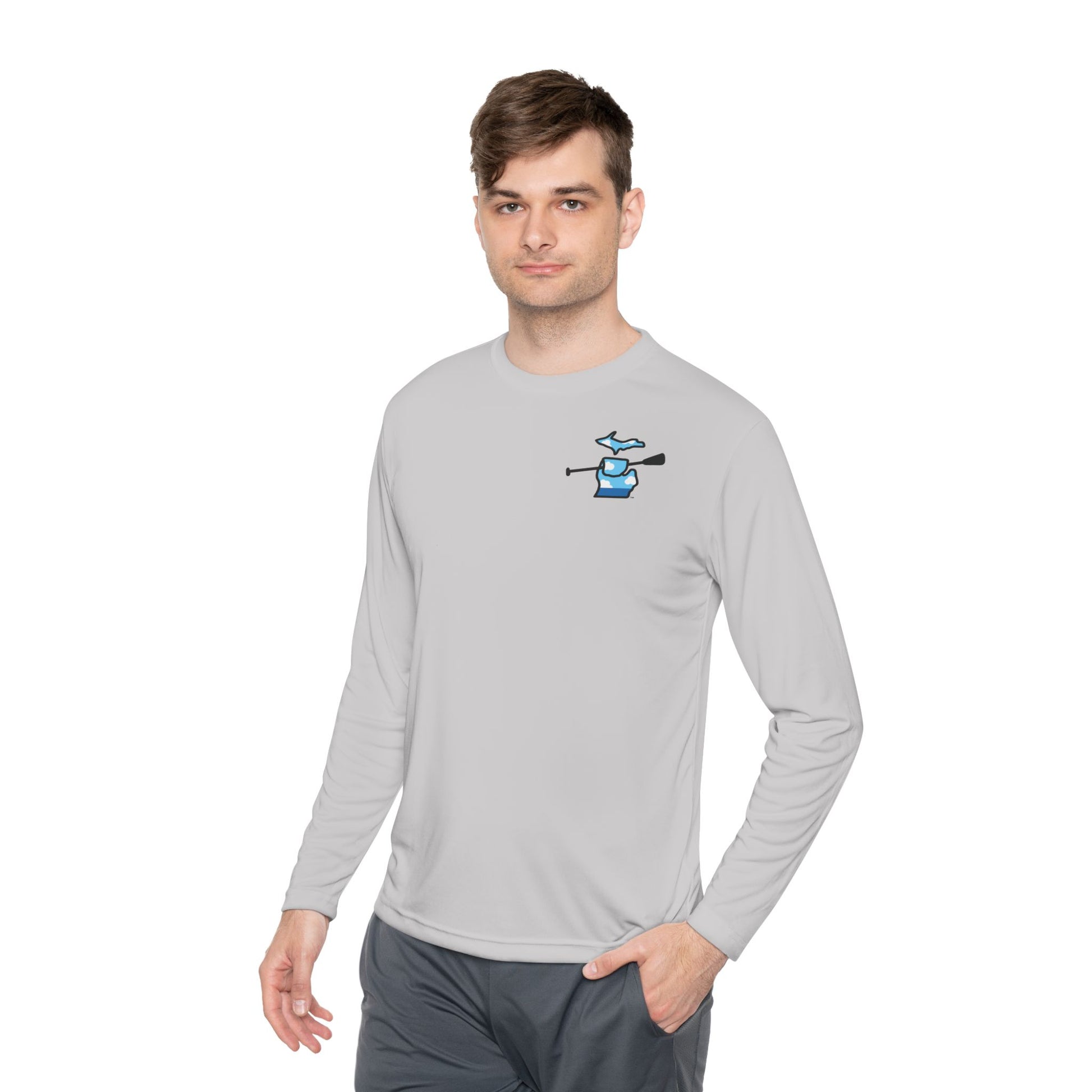 Man wearing a Michigan moisture-wicking long sleeve t-shirt in gray color for kayaking, canoeing and paddleboarding with Grab Life by the Hand™ design.