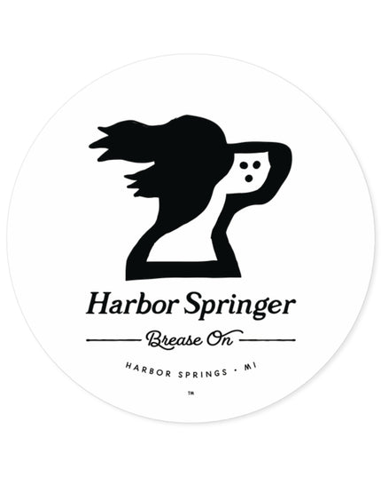 Michigan brand Harbor Springer springer spaniel dog logo with Brease On tagline on a round sticker.